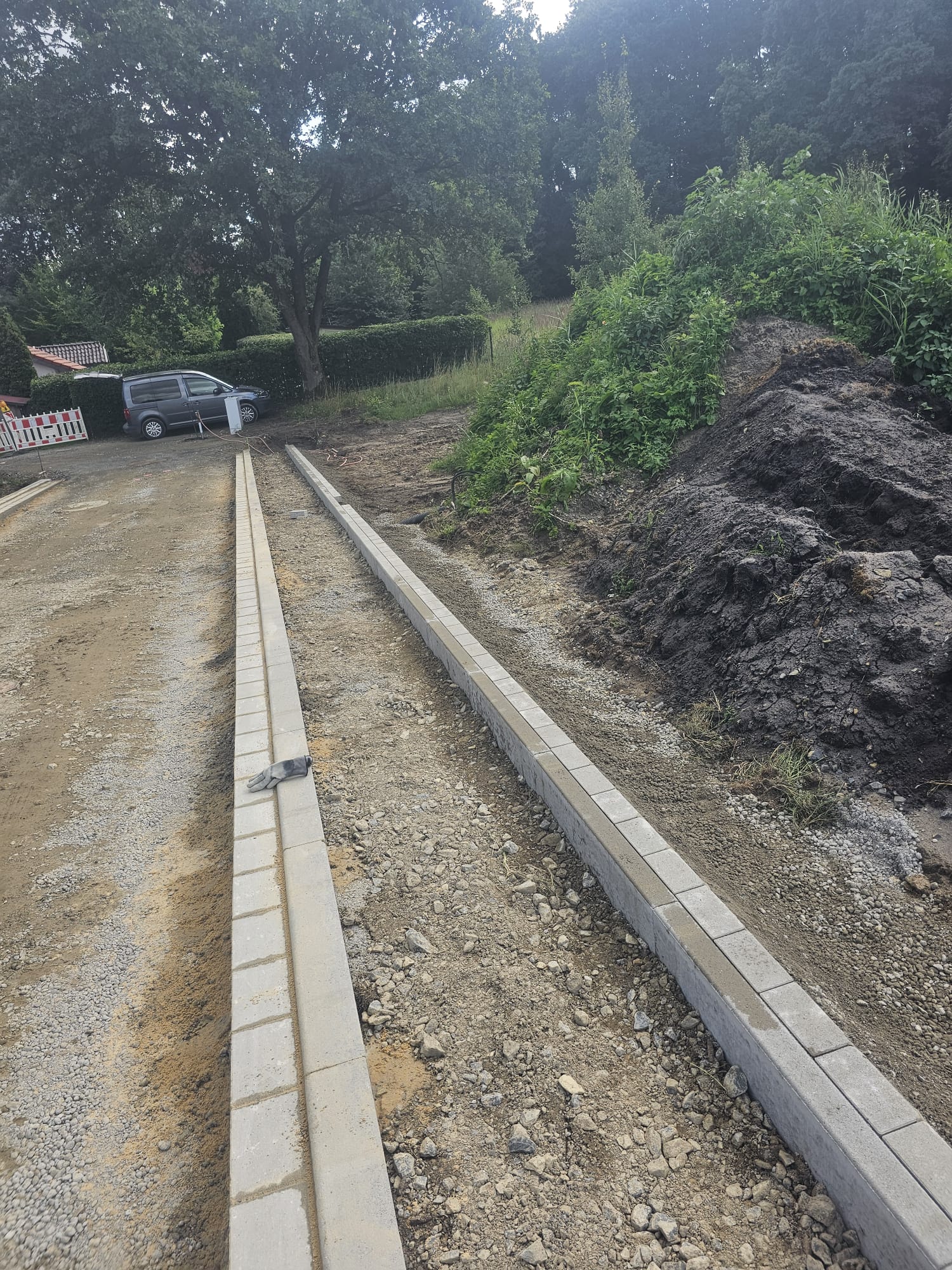 Wegebau Randsteine Installation